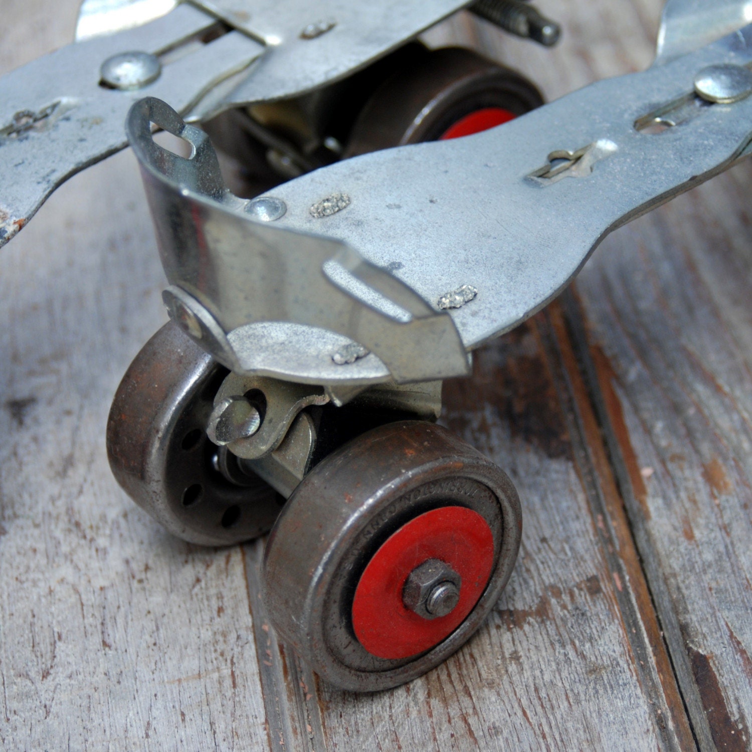 Antique Roller Skates metal with red wheels by plundered on Etsy