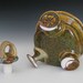 funky footed loopy handle teapot