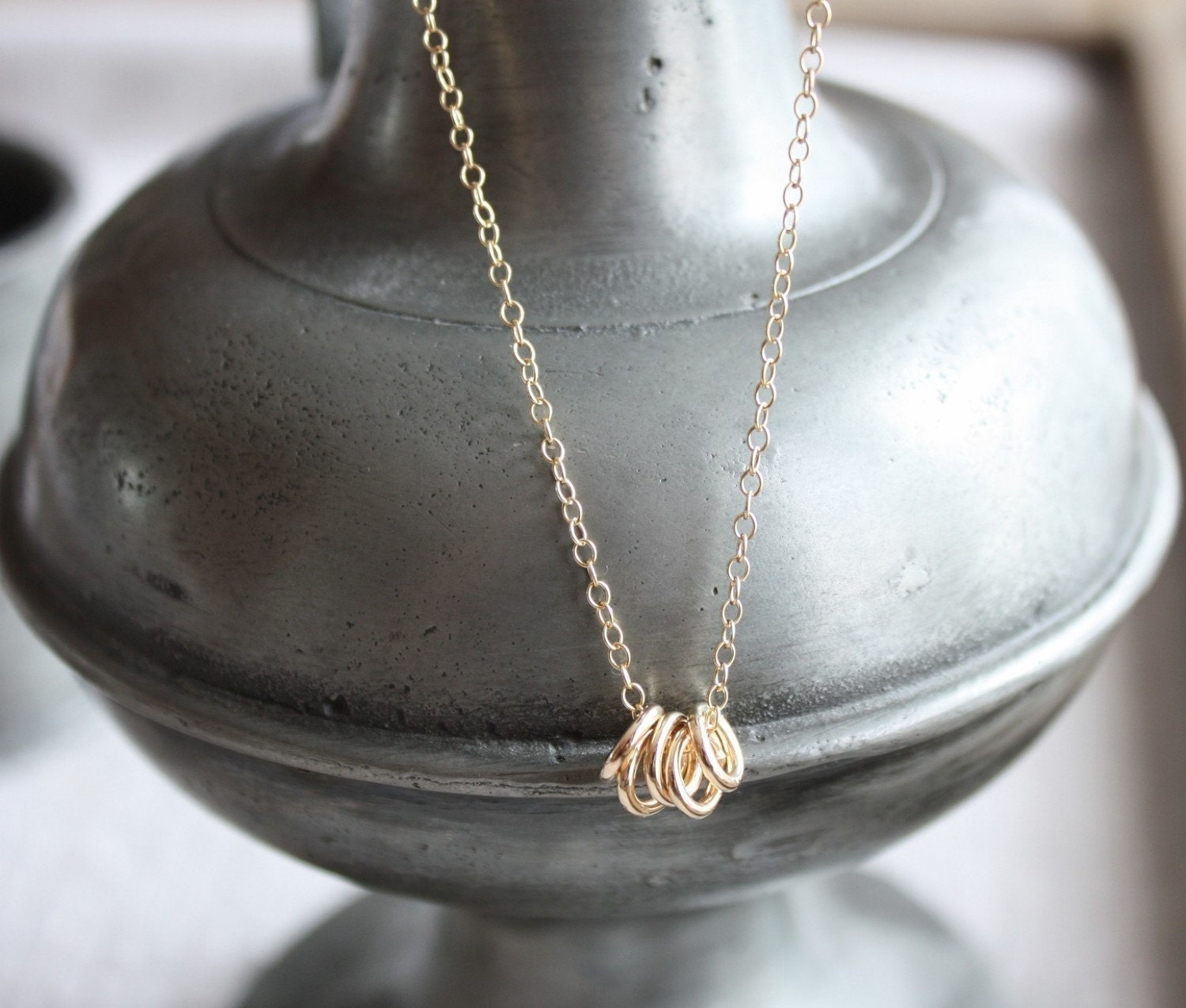 gold rings necklace- the quintet