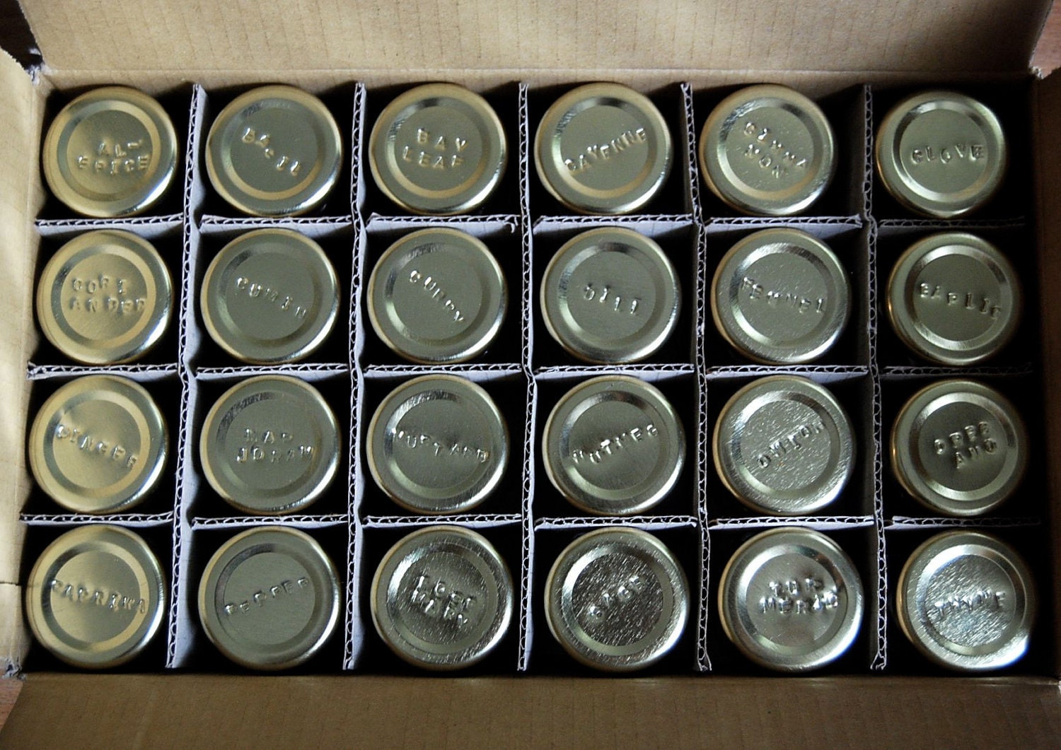 Spice Rack. Organize your spices with this custom set of 24 empty magnetic glass jars with your choice of spice names.