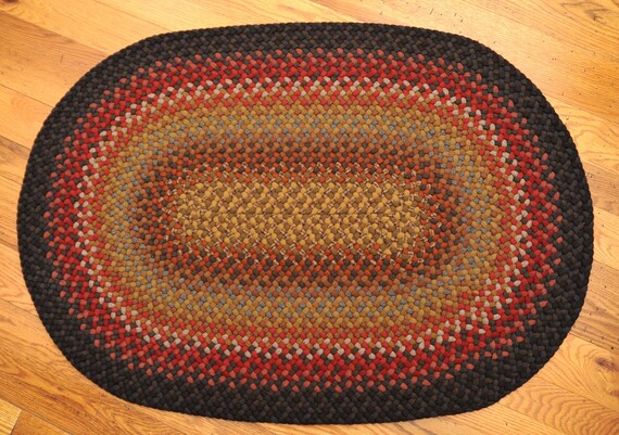 Handmade Oval Wool Braided Rug in brown red by StoneHouseCrafts