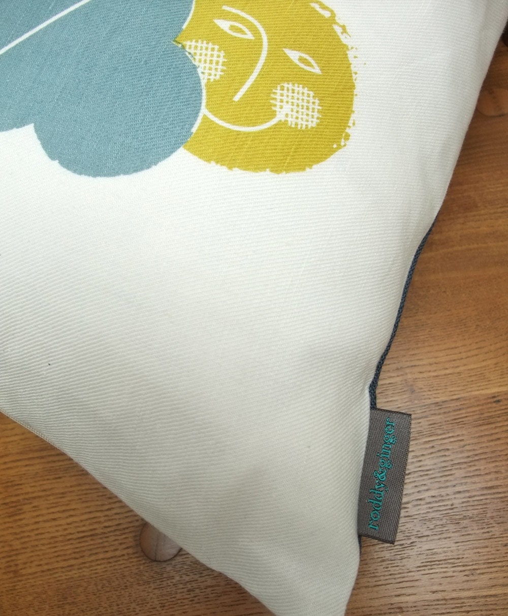 Ballooning cushion on white linen