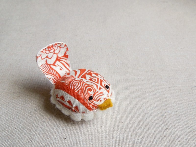 Small Decorative Orange and White Bird