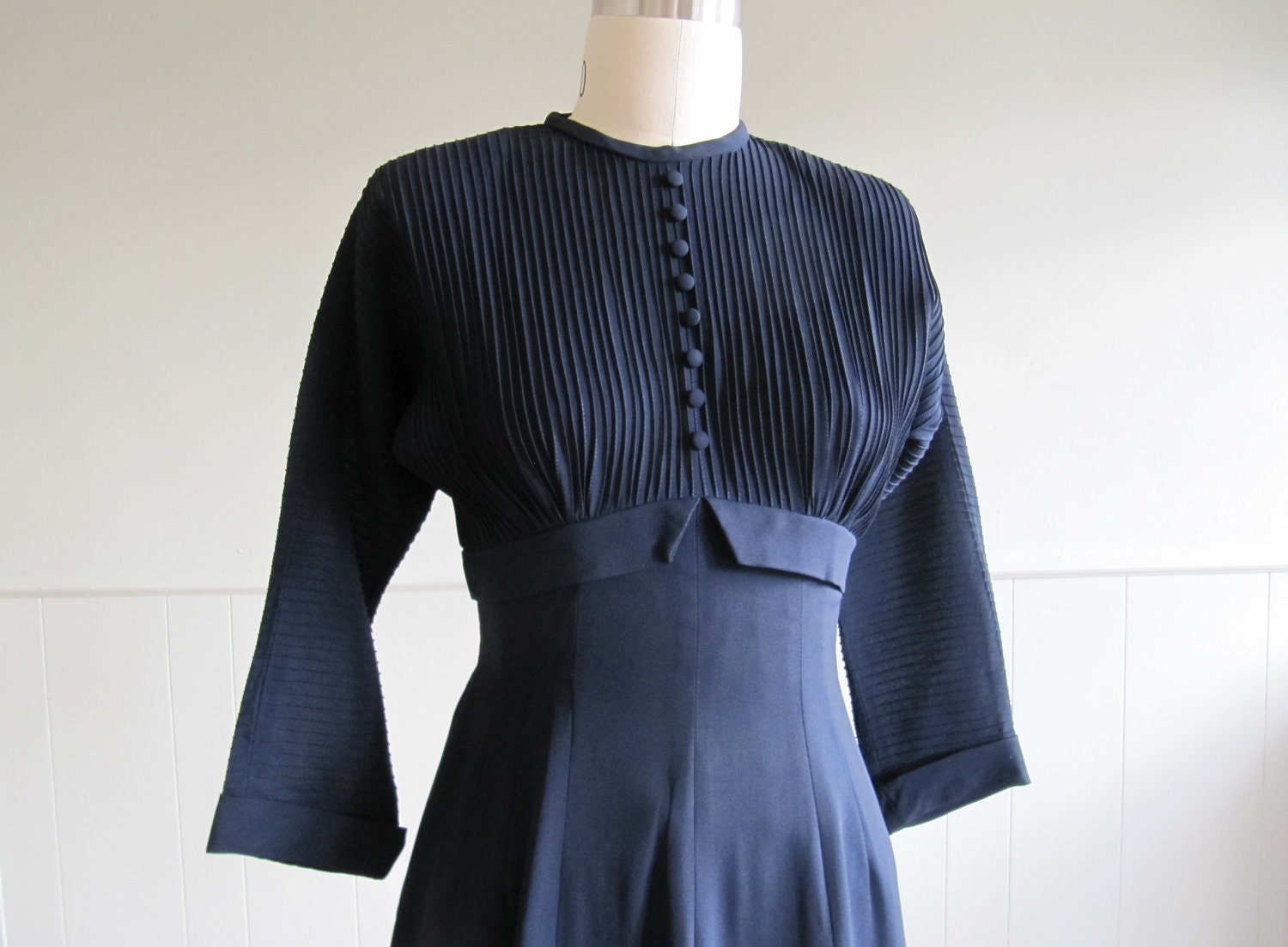 1940s vintage navy blue pin tucked empire waist dress