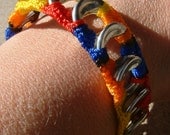 ReCycladelic Upcycled  Pop Top Bracelet Bold Rainbow in Red Orange Yellow and Blue Soda Can Pop Tab Jewelry