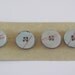 LighT BluE ButtoN-----------Red StripeS