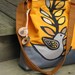 Summer Excitement shoulder bag in tangerine and gray of water repellent canvas with six large pockets and adjustable strap