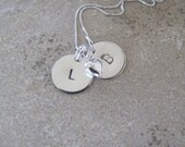 Double disks with heart in sterling