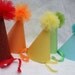 Glittery Rainbow Party Banner in Brights with ribbon streamers and clouds 16 pennants