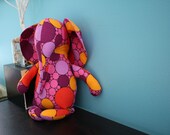 Sitting Stuffed Elephant with bright circles