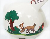 Personalized piggy bank on the Woods