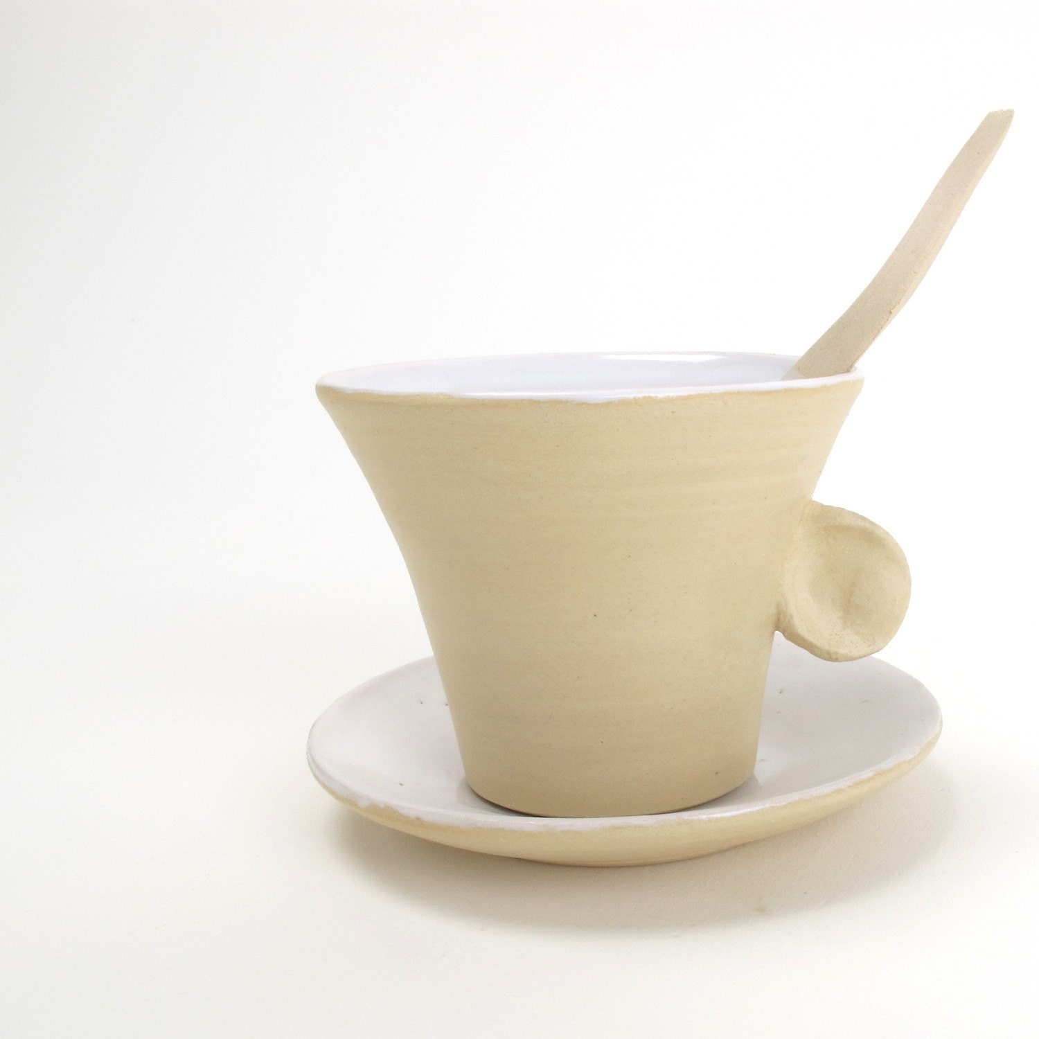 Earcup and saucer with a TingleTangleSpoon