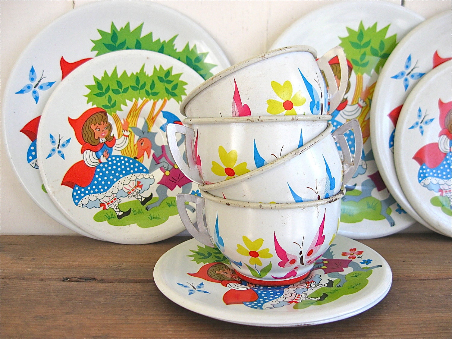 vintage tin toys plates, cups, saucers little red riding hood and the wolf