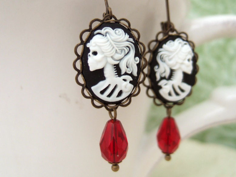 SKULL GODDESS antiqued brass earrings with resin cab and vintage red glass beads