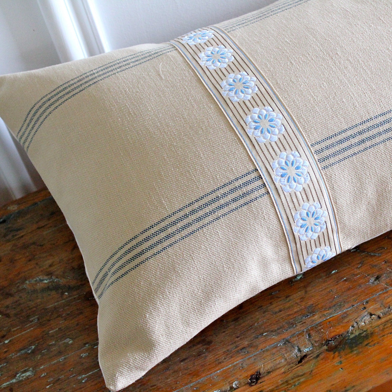 Natural Cotton Bolster Pillow with French embroidered daisy cotton trim