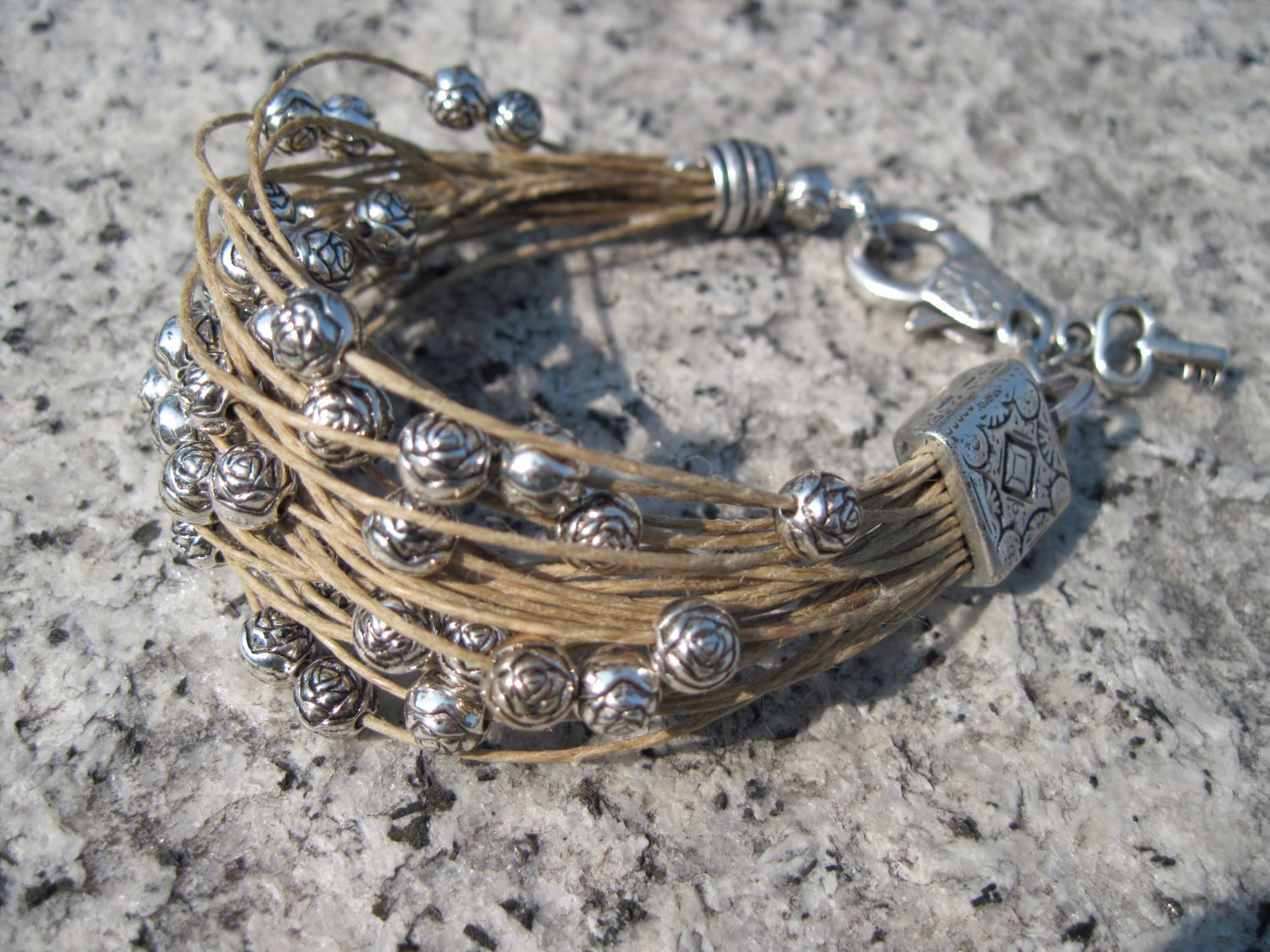 Hemp string bracelet and silver beads