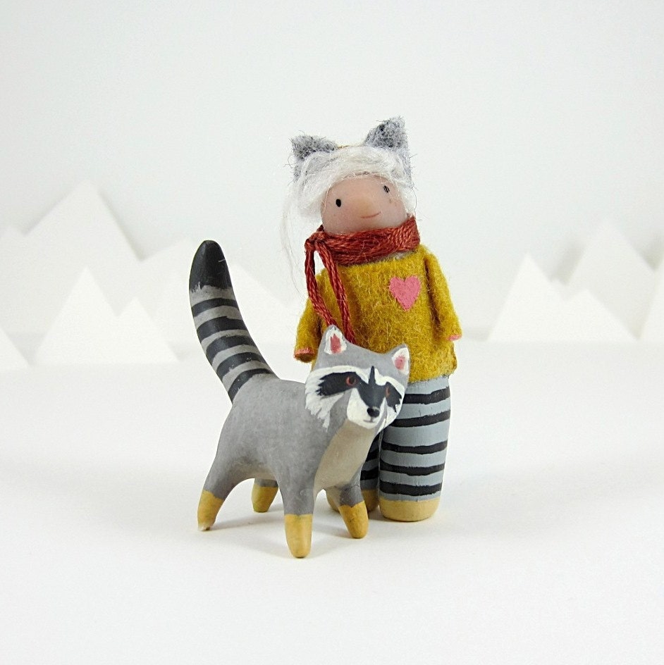 April and her raccoon friend- limited edition set by royalmint & handymaiden
