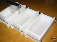 Soap mold. 1 to 2lb no liner soap molds and slicer blade. Wooden lids avail Toll Free 1-877-890-0267 E.