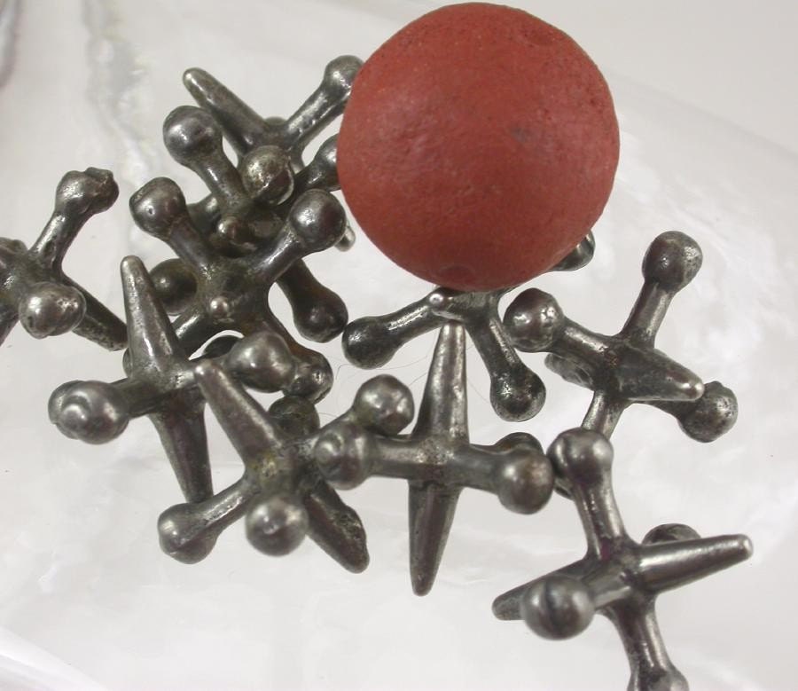 Antique Jacks. Set of 10 thick steel jacks with by derbyhouse