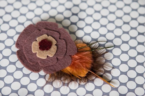 Brown felt flower w/feathers hair clip