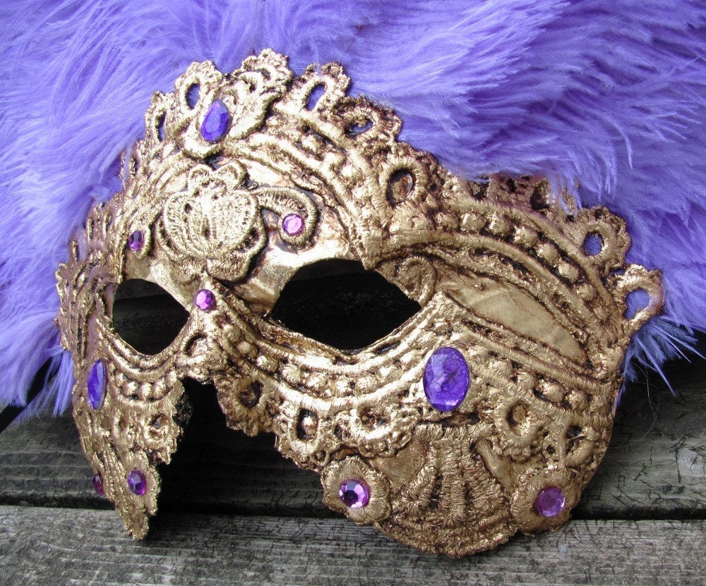 Venetian feather carnival mask in gold with purple ostrich feathers , Mauve