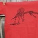 Spinosaurus skeleton hand drawn design on Bright Red American Apparel for kids