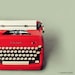 red typewriter print