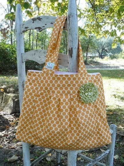 Diaper Bag for on the GO.... perfect size  for the quick trip.....Orange Full Moon with green rosette