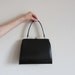 1950 black handbag of dreams . stiff leather lady coronette purse .sale