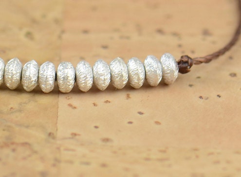 Sterling silver friendship cord bracelet