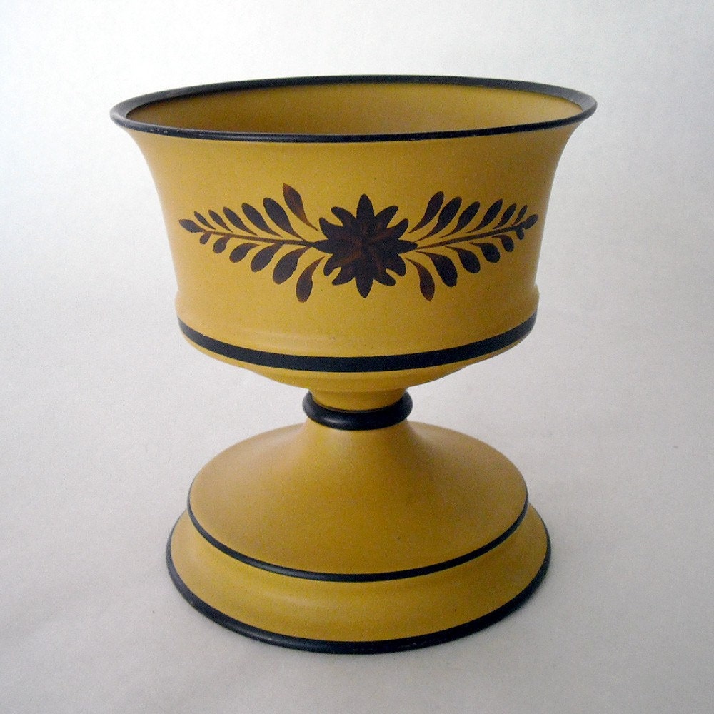 VINTAGE GOLDEN OCHRE PAINTED METALWARE CONTAINER VASE ON PEDESTAL BASE WITH BLACK TRIM