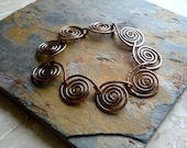 Rustic Bracelet. Copper. Metalwork. Spirals. Wire Work.  Metal. Linked Bracelet. Patina. Circle Shape - fitzUniqueli