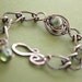 Lampwork copper bracelet with a handmade chain in adjustable length.