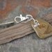 Key Chain with Natural Beach Rock and Silver Colored Charm