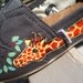 giraffes painted on TOMS shoes