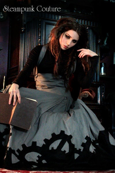 The Gearwerks dress by Steampunk Couture. Grey underbust dress and black high collar bib top Victorian gears