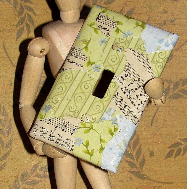 mini collage on a light switch cover