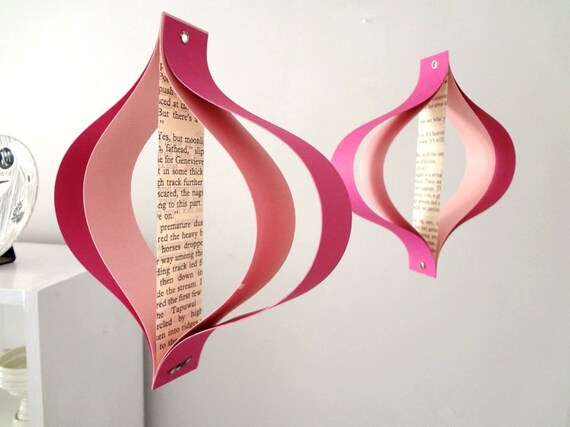 Valentines Day paper decorations, recycled romance novels, retro geometric curves, pink white