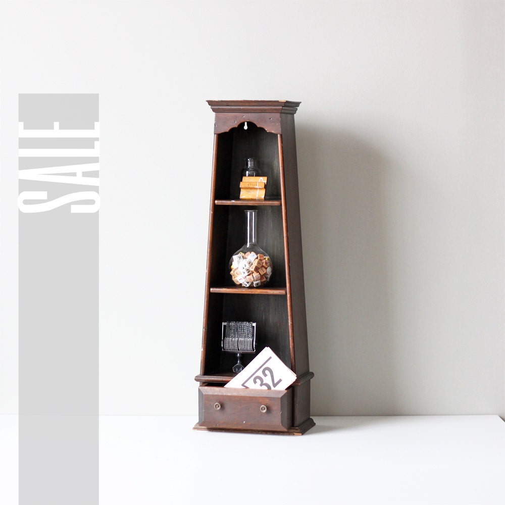 vintage open shelf curio cabinet