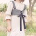 Hankerchief dirndl in grey wool with vintage lace trim