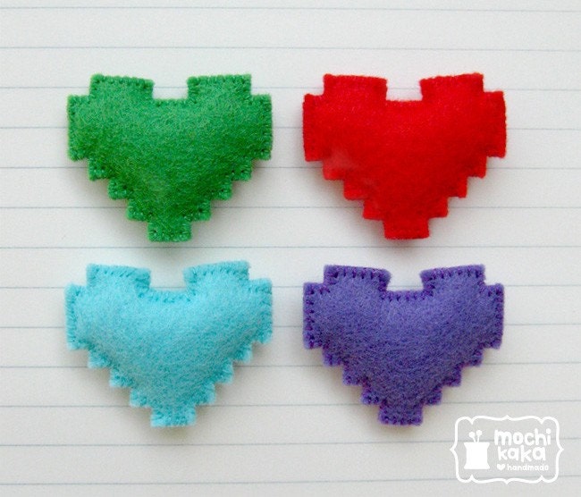The little set of 4 pixel heart magnets or brooches