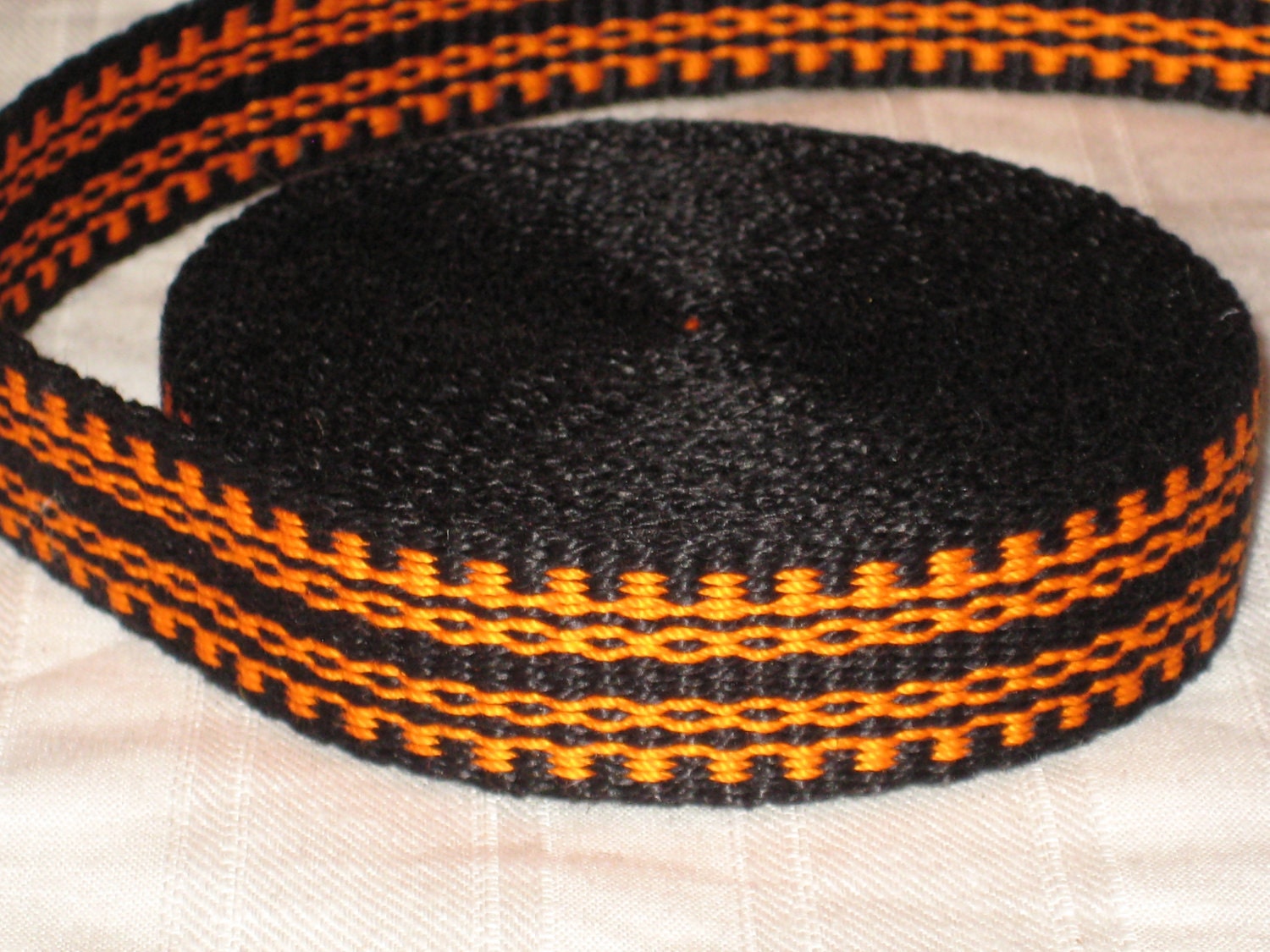 Black and orange hand woven inkle trim (over 14 feet)