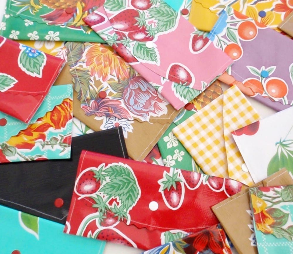 One Dozen Assorted Oilcloth Coupon/Receipt Wallets