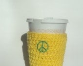 Yellow Crocheted Wrist Cuff or Cup Cozy w Green peace sign applique