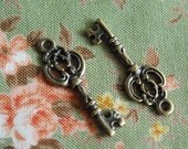 Beautiful key Style 1 brass charm - 3 ITEMS - pendant - Antique looking -