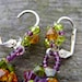 Swarovski crystallized dangle elegant colorful earrings purple orange green fall fashion autumn trends glass beads sparkling