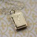 The Tiniest Vintage Sterling Silver Book Locket