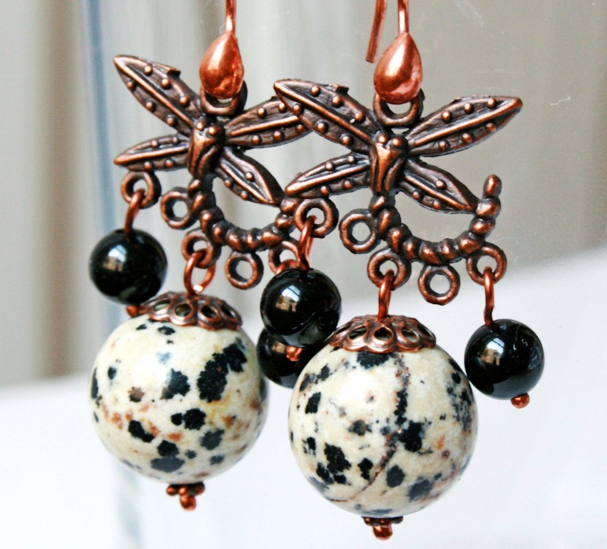 Chocolate Dragonflies Earrings with small textured dragonfly charms with large dolmatian jasper and polished black onyx  beads, gourmet chic