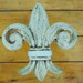 Distressed Fleur De Lis Window Treatment Brackets.