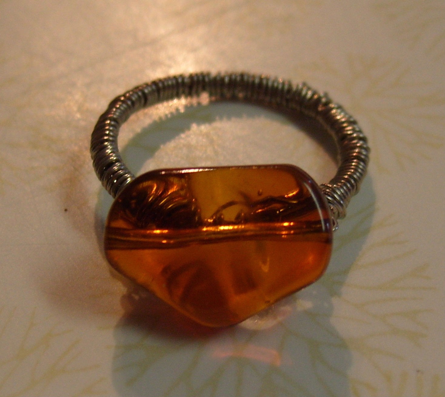 Size 8.5 Ring with Topaz colored charm